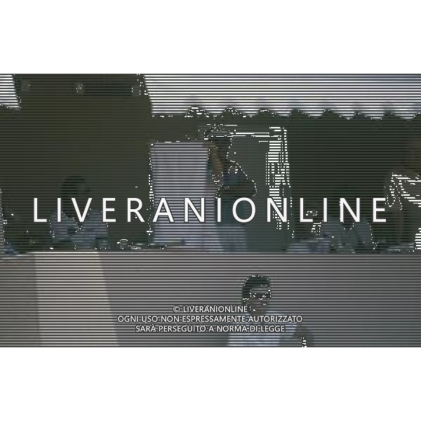 DIAP-RETROSPETTIVA ROGER MOORE ATTORE NELLA FOTO ROGER MOORE A MONTECARLO AL TORNEO DI TENNIS NELL\'ANNO 1988 AG ALDO LIVERANI SAS