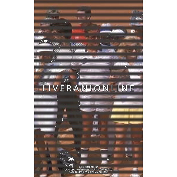 DIAP-RETROSPETTIVA ROGER MOORE ATTORE NELLA FOTO ROGER MOORE A MONTECARLO AL TORNEO DI TENNIS NELL\'ANNO 1988 AG ALDO LIVERANI SAS