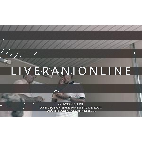 DIAP-RETROSPETTIVA ROGER MOORE ATTORE NELLA FOTO ROGER MOORE A MONTECARLO AL TORNEO DI TENNIS NELL\'ANNO 1988 AG ALDO LIVERANI SAS