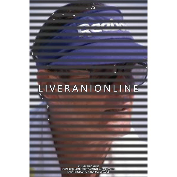 DIAP-RETROSPETTIVA ROGER MOORE ATTORE NELLA FOTO ROGER MOORE A MONTECARLO AL TORNEO DI TENNIS NELL\'ANNO 1988 AG ALDO LIVERANI SAS