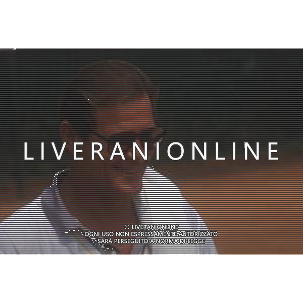 DIAP-RETROSPETTIVA ROGER MOORE ATTORE NELLA FOTO ROGER MOORE A MONTECARLO AL TORNEO DI TENNIS NELL\'ANNO 1988 AG ALDO LIVERANI SAS