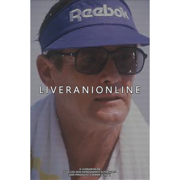 DIAP-RETROSPETTIVA ROGER MOORE ATTORE NELLA FOTO ROGER MOORE A MONTECARLO AL TORNEO DI TENNIS NELL\'ANNO 1988 AG ALDO LIVERANI SAS