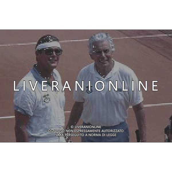 DIAP-RETROSPETTIVA ROGER MOORE ATTORE NELLA FOTO ROGER MOORE A MONTECARLO AL TORNEO DI TENNIS NELL\'ANNO 1988 AG ALDO LIVERANI SAS