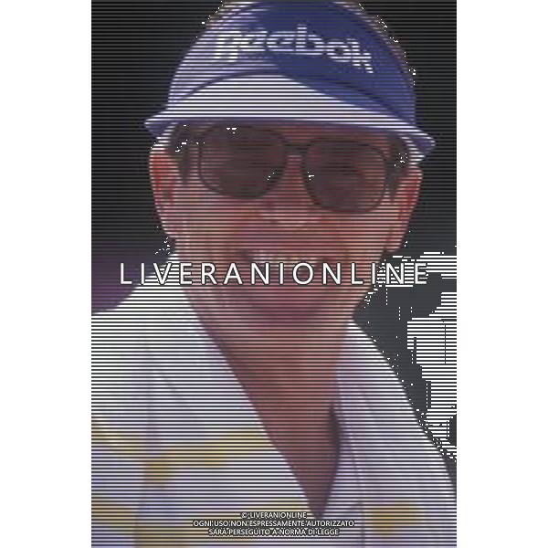 DIAP-RETROSPETTIVA ROGER MOORE ATTORE NELLA FOTO ROGER MOORE A MONTECARLO AL TORNEO DI TENNIS NELL\'ANNO 1988 AG ALDO LIVERANI SAS