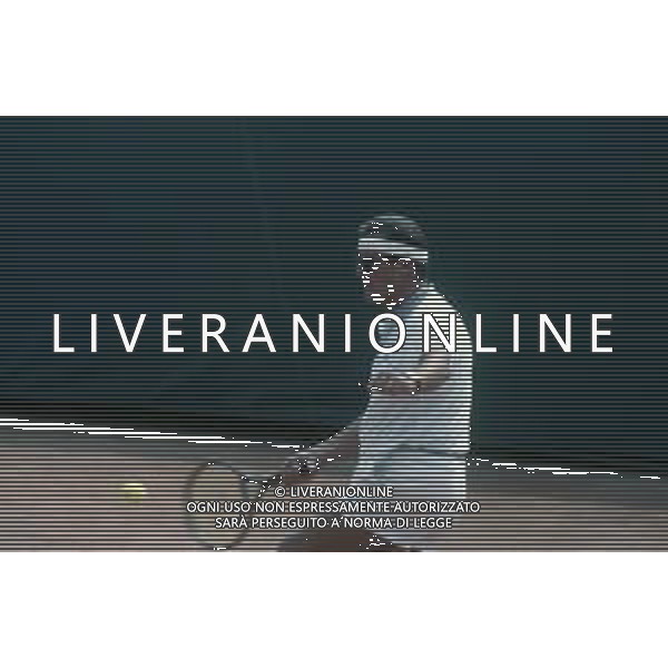 DIAP-RETROSPETTIVA ROGER MOORE ATTORE NELLA FOTO ROGER MOORE A MONTECARLO AL TORNEO DI TENNIS NELL\'ANNO 1988 AG ALDO LIVERANI SAS