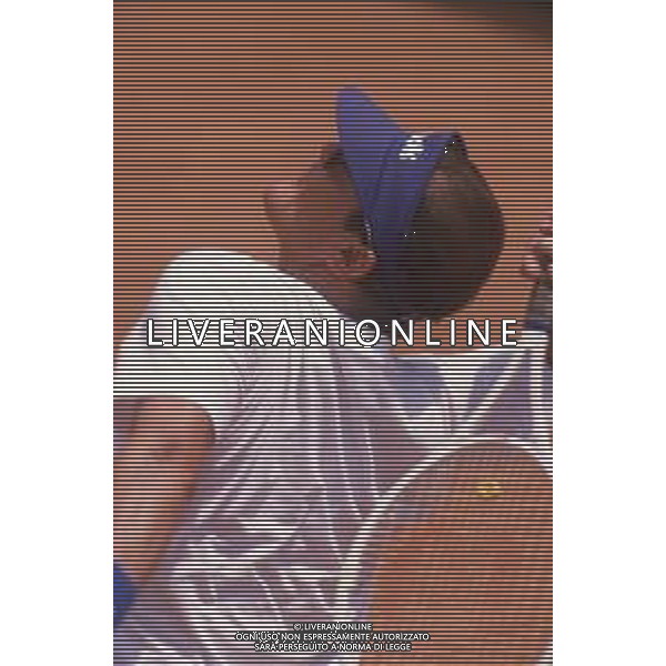 DIAP-RETROSPETTIVA ROGER MOORE ATTORE NELLA FOTO ROGER MOORE A MONTECARLO AL TORNEO DI TENNIS NELL\'ANNO 1988 AG ALDO LIVERANI SAS