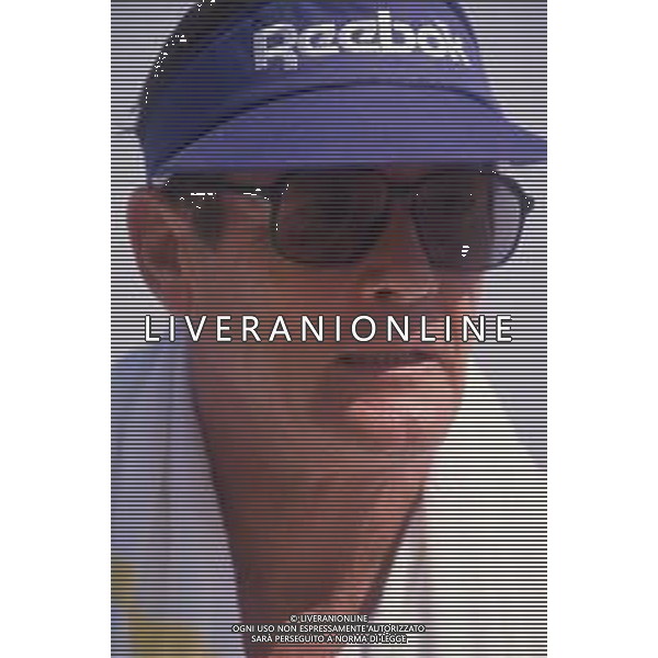 DIAP-RETROSPETTIVA ROGER MOORE ATTORE NELLA FOTO ROGER MOORE A MONTECARLO AL TORNEO DI TENNIS NELL\'ANNO 1988 AG ALDO LIVERANI SAS