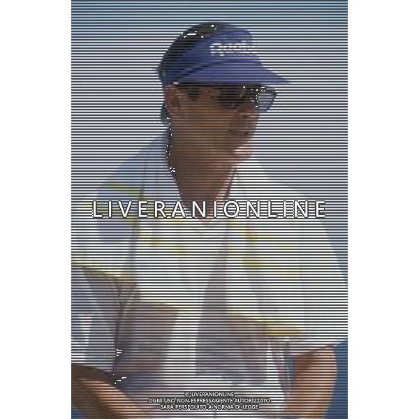 DIAP-RETROSPETTIVA ROGER MOORE ATTORE NELLA FOTO ROGER MOORE A MONTECARLO AL TORNEO DI TENNIS NELL\'ANNO 1988 AG ALDO LIVERANI SAS