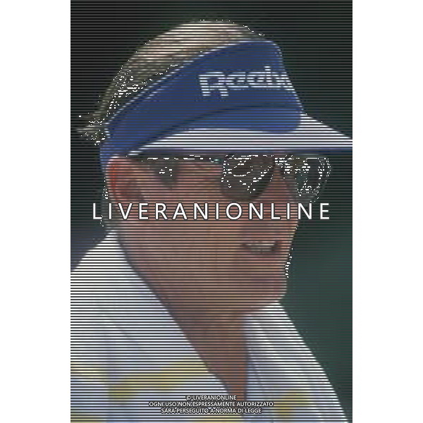 DIAP-RETROSPETTIVA ROGER MOORE ATTORE NELLA FOTO ROGER MOORE A MONTECARLO AL TORNEO DI TENNIS NELL\'ANNO 1988 AG ALDO LIVERANI SAS