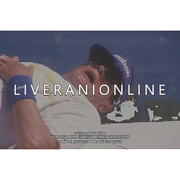 DIAP-RETROSPETTIVA ROGER MOORE ATTORE NELLA FOTO ROGER MOORE A MONTECARLO AL TORNEO DI TENNIS NELL\'ANNO 1988 AG ALDO LIVERANI SAS