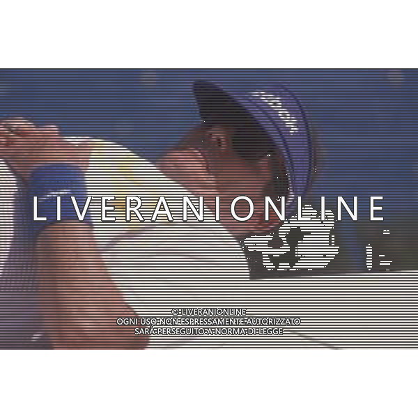 DIAP-RETROSPETTIVA ROGER MOORE ATTORE NELLA FOTO ROGER MOORE A MONTECARLO AL TORNEO DI TENNIS NELL\'ANNO 1988 AG ALDO LIVERANI SAS