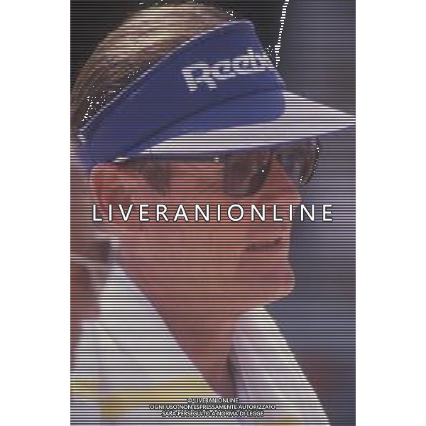 DIAP-RETROSPETTIVA ROGER MOORE ATTORE NELLA FOTO ROGER MOORE A MONTECARLO AL TORNEO DI TENNIS NELL\'ANNO 1988 AG ALDO LIVERANI SAS