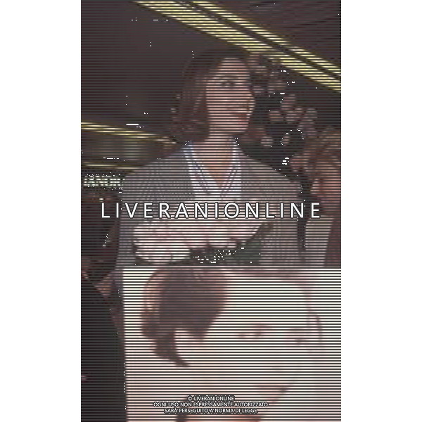 DIAP-RETROSPETTIVA ISABELLA ROSSELLINI ATTRICE NELLA FOTO ISABELLA ROSSELLINI A MILANO ALLA PRESENTAZIONE DEL NUOVO PROFOFUMO DELLA LANCOME “ TRESOR“ NELL\'ANNO 1991 AG ALDO LIVERANI SAS