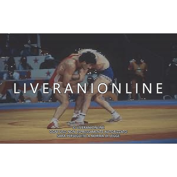 DIAP-RETROSPETTIVA VINCENZO MAENZA LOTTATORE NELLA FOTO VINCENZO MAENZA PARTECIPA ALLE OLIMPIADI DI LOS ANGELES 1984 ARCHIVIO DFP-AG ALDO LIVERANI SAS