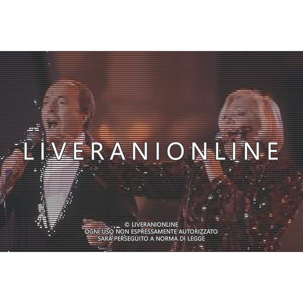 DIAP-RETROSPETTIVA CARLA BONI CANTANTE NELLA FOTO CARLA BONI CON GINO LATILLA ALLA TRASMISSIONE TELEVISIVA “C\'ERA UNA VOLTA IL FESTIVAL “ NELL\'ANNO 1990 AG ALDO LIVERANI SAS