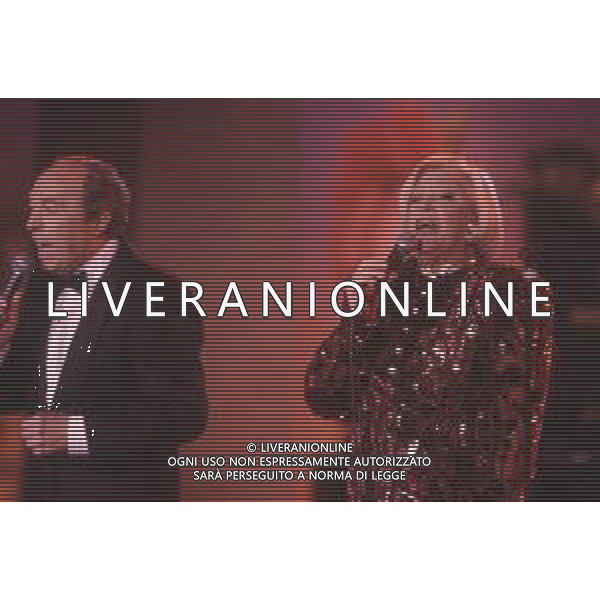 DIAP-RETROSPETTIVA CARLA BONI CANTANTE NELLA FOTO CARLA BONI CON GINO LATILLA ALLA TRASMISSIONE TELEVISIVA “C\'ERA UNA VOLTA IL FESTIVAL “ NELL\'ANNO 1990 AG ALDO LIVERANI SAS
