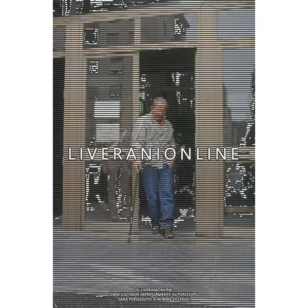 DIAP-RETROSPETTIVA DOMENIICO MODUGNO CANTANTE NELLA FOT DOMENICO MODUGNOO CON LA MOGLIE FRANCA GANDOLFI IN TRIBENALE A MILANO NELL\'ANNO 1986 AG ALDO LIVERANI SAS