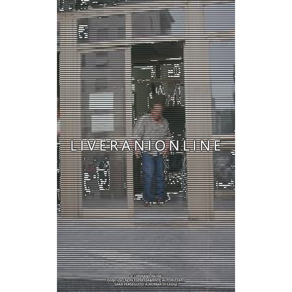 DIAP-RETROSPETTIVA DOMENIICO MODUGNO CANTANTE NELLA FOT DOMENICO MODUGNOO CON LA MOGLIE FRANCA GANDOLFI IN TRIBENALE A MILANO NELL\'ANNO 1986 AG ALDO LIVERANI SAS