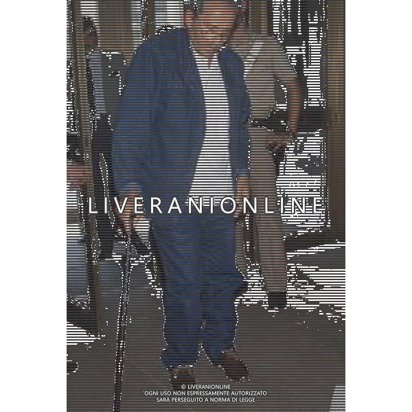 DIAP-RETROSPETTIVA DOMENIICO MODUGNO CANTANTE NELLA FOT DOMENICO MODUGNOO CON LA MOGLIE FRANCA GANDOLFI IN TRIBENALE A MILANO NELL\'ANNO 1986 AG ALDO LIVERANI SAS