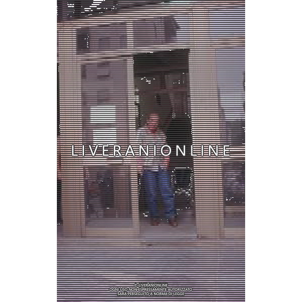 DIAP-RETROSPETTIVA DOMENIICO MODUGNO CANTANTE NELLA FOT DOMENICO MODUGNOO CON LA MOGLIE FRANCA GANDOLFI IN TRIBENALE A MILANO NELL\'ANNO 1986 AG ALDO LIVERANI SAS