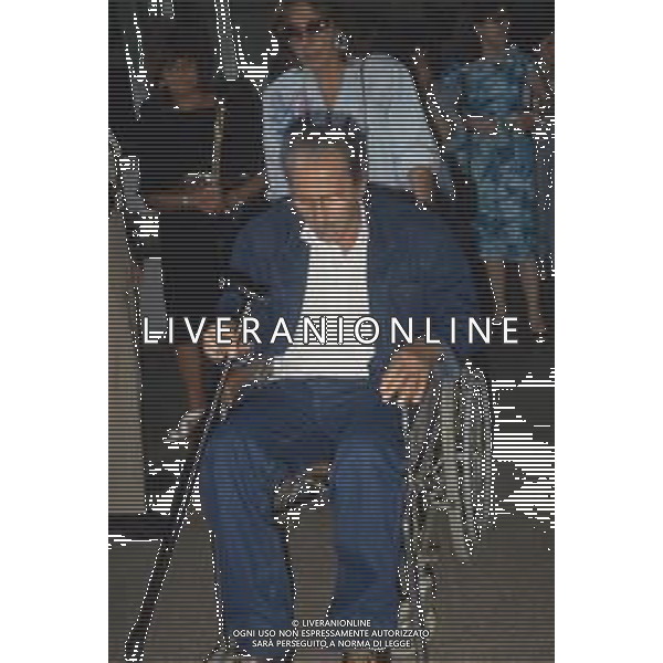 DIAP-RETROSPETTIVA DOMENIICO MODUGNO CANTANTE NELLA FOT DOMENICO MODUGNOO CON LA MOGLIE FRANCA GANDOLFI IN TRIBENALE A MILANO NELL\'ANNO 1986 AG ALDO LIVERANI SAS