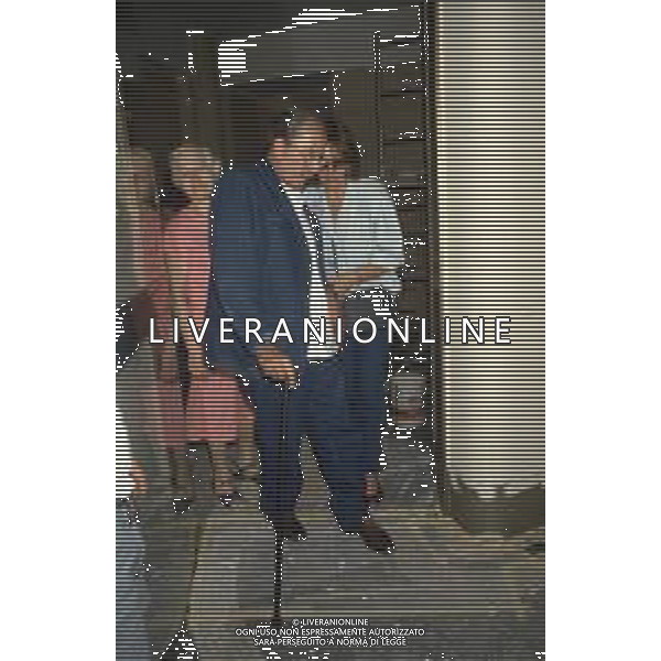 DIAP-RETROSPETTIVA DOMENIICO MODUGNO CANTANTE NELLA FOT DOMENICO MODUGNOO CON LA MOGLIE FRANCA GANDOLFI IN TRIBENALE A MILANO NELL\'ANNO 1986 AG ALDO LIVERANI SAS