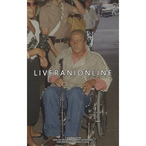DIAP-RETROSPETTIVA DOMENIICO MODUGNO CANTANTE NELLA FOT DOMENICO MODUGNOO CON LA MOGLIE FRANCA GANDOLFI IN TRIBENALE A MILANO NELL\'ANNO 1986 AG ALDO LIVERANI SAS