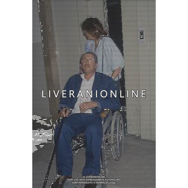 DIAP-RETROSPETTIVA DOMENIICO MODUGNO CANTANTE NELLA FOT DOMENICO MODUGNOO CON LA MOGLIE FRANCA GANDOLFI IN TRIBENALE A MILANO NELL\'ANNO 1986 AG ALDO LIVERANI SAS