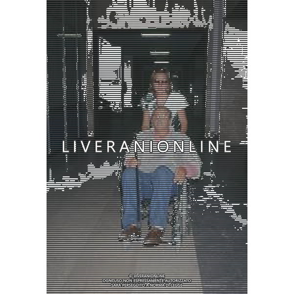 DIAP-RETROSPETTIVA DOMENIICO MODUGNO CANTANTE NELLA FOT DOMENICO MODUGNOO CON LA MOGLIE FRANCA GANDOLFI IN TRIBENALE A MILANO NELL\'ANNO 1986 AG ALDO LIVERANI SAS