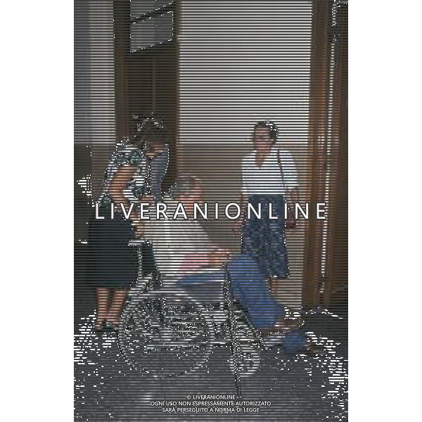 DIAP-RETROSPETTIVA DOMENIICO MODUGNO CANTANTE NELLA FOT DOMENICO MODUGNOO CON LA MOGLIE FRANCA GANDOLFI IN TRIBENALE A MILANO NELL\'ANNO 1986 AG ALDO LIVERANI SAS