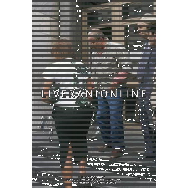 DIAP-RETROSPETTIVA DOMENIICO MODUGNO CANTANTE NELLA FOT DOMENICO MODUGNOO CON LA MOGLIE FRANCA GANDOLFI IN TRIBENALE A MILANO NELL\'ANNO 1986 AG ALDO LIVERANI SAS