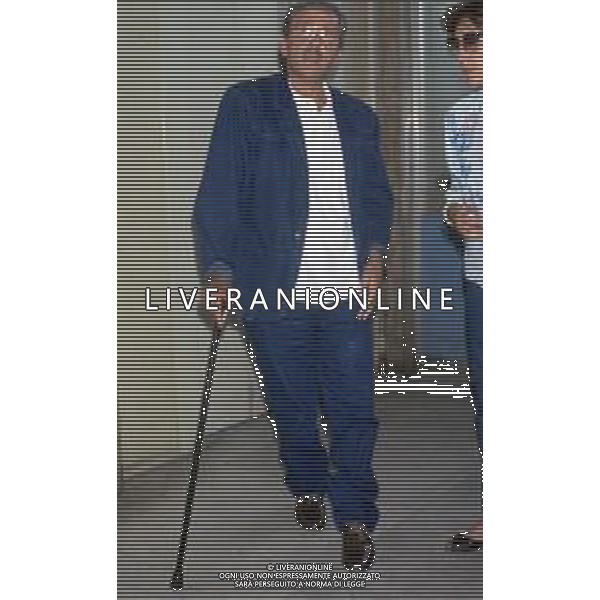 DIAP-RETROSPETTIVA DOMENIICO MODUGNO CANTANTE NELLA FOT DOMENICO MODUGNOO CON LA MOGLIE FRANCA GANDOLFI IN TRIBENALE A MILANO NELL\'ANNO 1986 AG ALDO LIVERANI SAS