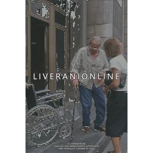 DIAP-RETROSPETTIVA DOMENIICO MODUGNO CANTANTE NELLA FOT DOMENICO MODUGNOO CON LA MOGLIE FRANCA GANDOLFI IN TRIBENALE A MILANO NELL\'ANNO 1986 AG ALDO LIVERANI SAS
