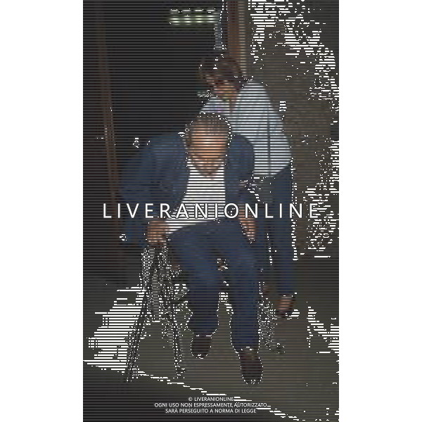 DIAP-RETROSPETTIVA DOMENIICO MODUGNO CANTANTE NELLA FOT DOMENICO MODUGNOO CON LA MOGLIE FRANCA GANDOLFI IN TRIBENALE A MILANO NELL\'ANNO 1986 AG ALDO LIVERANI SAS