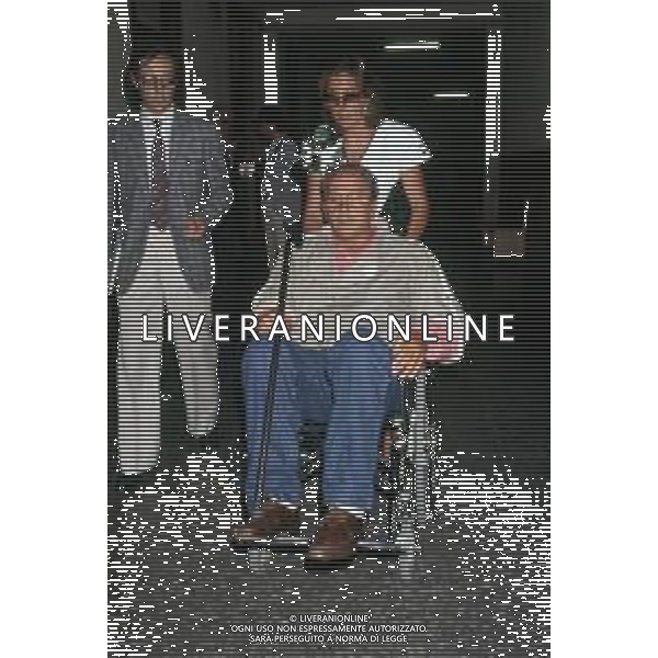 DIAP-RETROSPETTIVA DOMENIICO MODUGNO CANTANTE NELLA FOT DOMENICO MODUGNOO CON LA MOGLIE FRANCA GANDOLFI IN TRIBENALE A MILANO NELL\'ANNO 1986 AG ALDO LIVERANI SAS