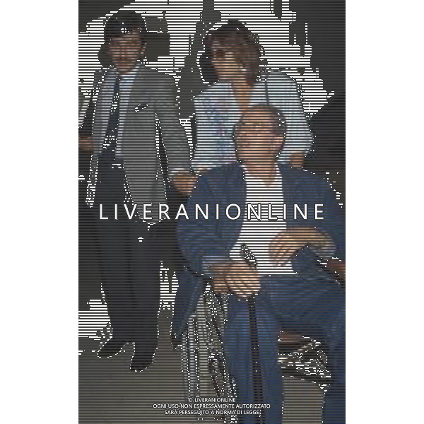 DIAP-RETROSPETTIVA DOMENIICO MODUGNO CANTANTE NELLA FOT DOMENICO MODUGNOO CON LA MOGLIE FRANCA GANDOLFI IN TRIBENALE A MILANO NELL\'ANNO 1986 AG ALDO LIVERANI SAS