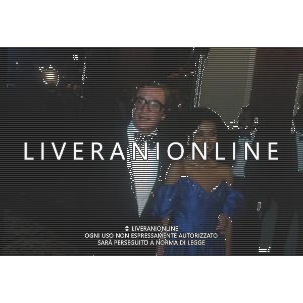 DIAP-RETROSPETTIVA MICHAEL CAINE ATTORE NELLA FOTO MICHAEL CAINE CON LA MOGLIE A CANNES NELL\'ANNO 1983 AG ALDO LIVERANI SAS