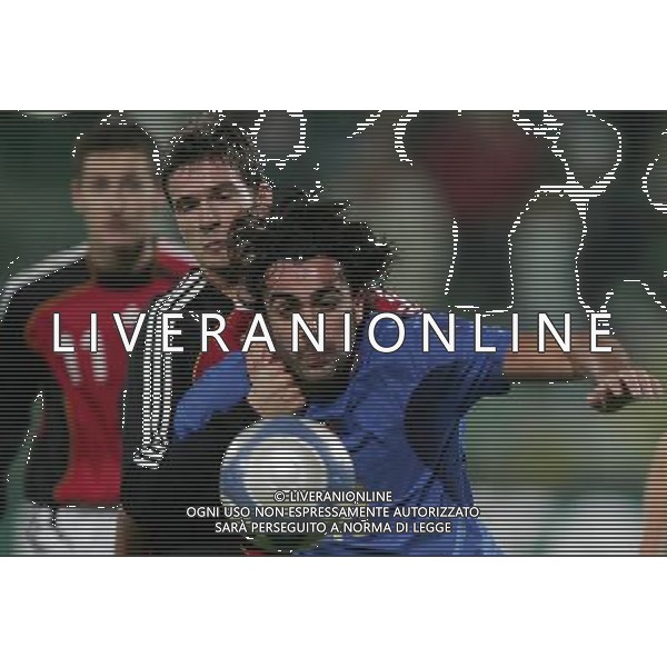 Firenze 1 marzo 2006 Italia - Germania amichevole nella foto: Barone Simone e Klose Miroslav foto Andry / Ag. Aldo Liverani