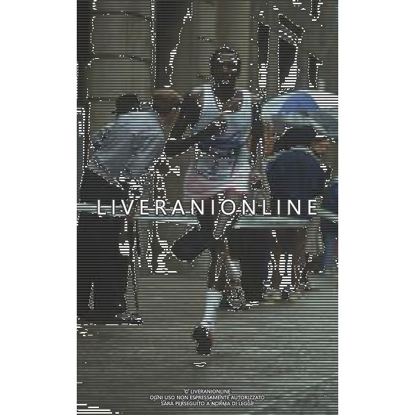 DIAP-RETROSPETTIVA JOHN NGUGI ATLETA NELLA FOTO JOHN NGUGI PARTECIPA ALLA STRAMILANO NELL\'ANNO 1989 AG ALDO LIVERANI SAS