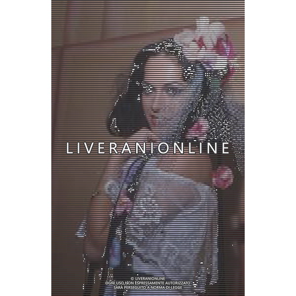 DIAP-RETROSPETTIVA DORA MORONI CANTANTE E PRESENTATRICE TELEVISIVA NELLA FOTO DORA MORONI VESTITO DA SPOSA A ROMA FOTO EDGARDO DELLA SCORCIOSA-AG ALDO LIVERANI SAS  