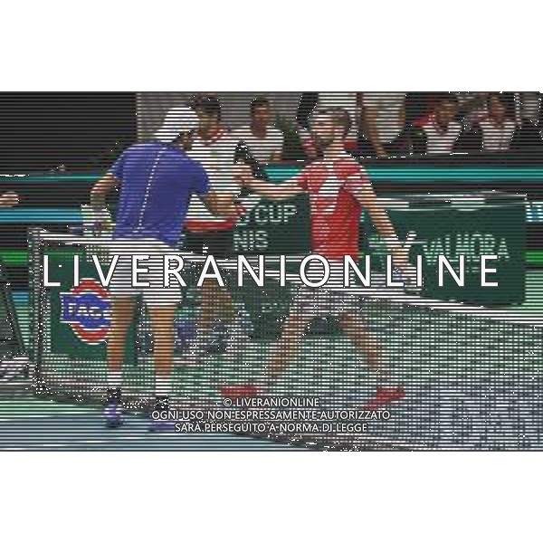 TVRCOR 19-11-2025 – 2025 Davis Cup Finals - Final Eight Bologna (BO) – SuperTennis Arena di BolognaFiere - Italia vs Austria nella foto saluto finale tra Matteo Berrettini e Jurij Rodionov (AUT) FOTO ROBERTA CORRADIN-AG ALDO LIVERANI SAS