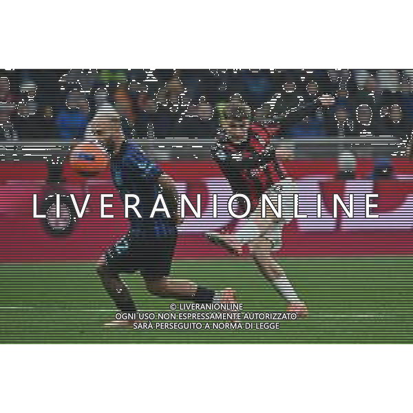 Inter vs Milan nella foto Alexis Saelemaekers (Milan) al tiro Milano 23-11-2025 Stadio Giuseppe Meazza - San Siro Inter vs Milan Campionato Serie A Enilive - 12a giornata foto Roberto Garavaglia/Agenzia Aldo Liverani sas