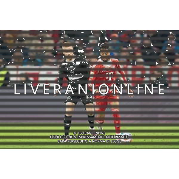 im Zweikampf, Aktion, mit Louis Oppie #23 (FC St. Pauli), Michael Olise #17 (FC Bayern Muenchen), FC Bayern Muenchen vs. FC St. Pauli, Fussball, 1. Bundesliga, 12. Spieltag, 29.11.2025 DFB regulations prohibit any use of photographs as image sequences and/or quasi-video / action press AG KARMAPRESS-AG ALDO LIVERANI SAS