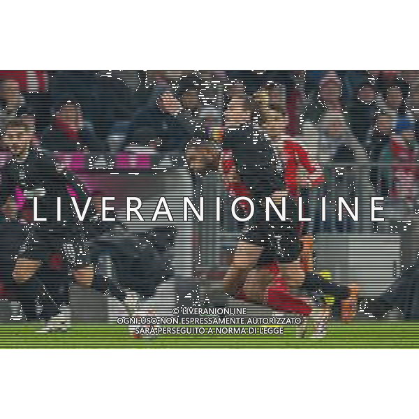 im Zweikampf, Aktion, mit Jonathan Tah #4 (FC Bayern Muenchen), Jackson Irvine #7 (FC St. Pauli), FC Bayern Muenchen vs. FC St. Pauli, Fussball, 1. Bundesliga, 12. Spieltag, 29.11.2025 DFB regulations prohibit any use of photographs as image sequences and/or quasi-video / action press AG KARMAPRESS-AG ALDO LIVERANI SAS