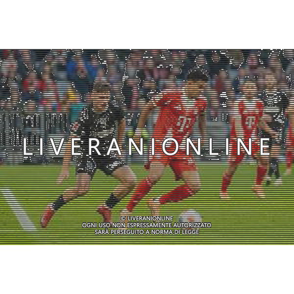 im Zweikampf, Aktion, mit Arkadiusz Pyrka #11 (FC St. Pauli), Luis Diaz #14 (FC Bayern Muenchen), FC Bayern Muenchen vs. FC St. Pauli, Fussball, 1. Bundesliga, 12. Spieltag, 29.11.2025 DFB regulations prohibit any use of photographs as image sequences and/or quasi-video / action press AG KARMAPRESS-AG ALDO LIVERANI SAS