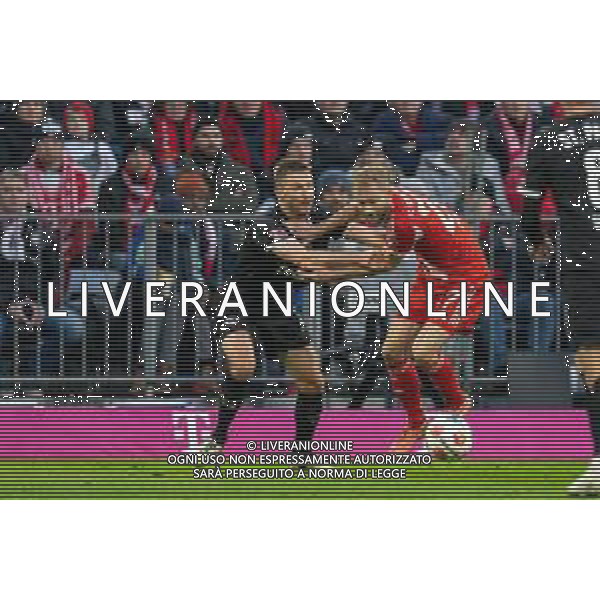 im Zweikampf, Aktion, mit Karol Mets #3 (FC St. Pauli), Konrad Laimer #27 (FC Bayern Muenchen), FC Bayern Muenchen vs. FC St. Pauli, Fussball, 1. Bundesliga, 12. Spieltag, 29.11.2025 DFB regulations prohibit any use of photographs as image sequences and/or quasi-video / action press AG KARMAPRESS-AG ALDO LIVERANI SAS