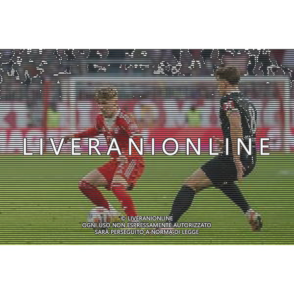 Karl Lennart #42 (FC Bayern Muenchen) im Zweikampf mit Maximilian Eggestein #8 (SC Freiburg), FC Bayern Muenchen - SC Freiburg, Fussball, Bundesliga, 11. Spieltag, 22.11.2025 DFB regulations prohibit any use of photographs as image sequences and/or quasi-video / action press AG KARMAPRESS-AG ALDO LIVERANI SAS