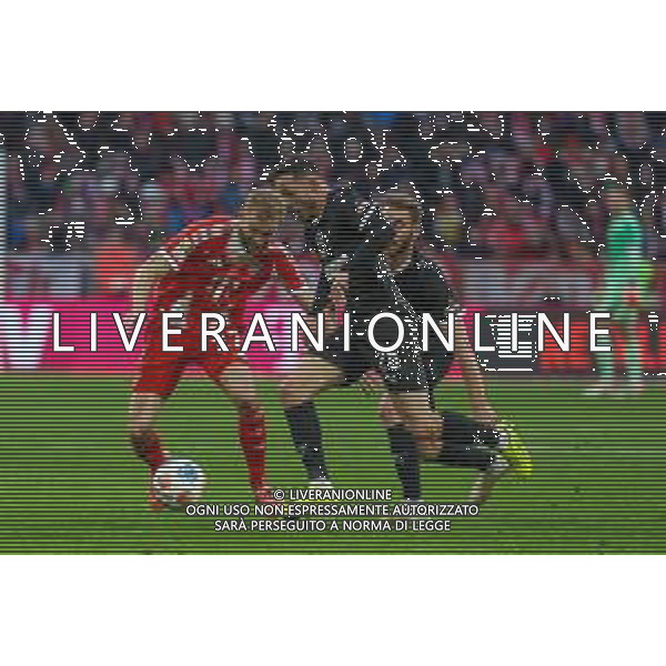 im Zweikampf, Aktion, mit Konrad Laimer #27 (FC Bayern Muenchen), Mathias Pereira Lage #28 (FC St. Pauli), FC Bayern Muenchen vs. FC St. Pauli, Fussball, 1. Bundesliga, 12. Spieltag, 29.11.2025 DFB regulations prohibit any use of photographs as image sequences and/or quasi-video / action press AG KARMAPRESS-AG ALDO LIVERANI SAS
