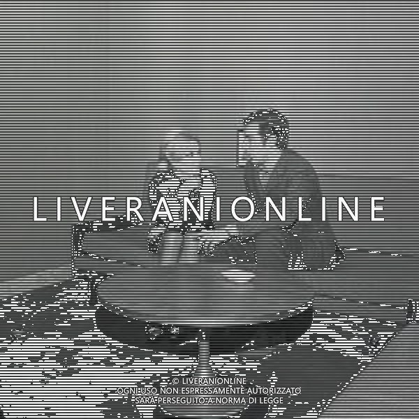 NEG-RETROSPETTIVA ANTONIO VALENTIN ANGELILLO CALCIATORE NELLA FOTO ANTONIO VALENTIN ANGELILLO CON LA BALLERINA ATTILIA TIRONI IN ARTE ILYA LOPEZ A MILANO NELL\'ANNO 1969 AG ALDO LIVERANI SAS