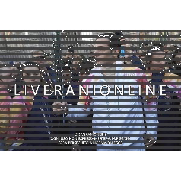 Roma 06 Dicembre 2025 Achille Lauro Tedoforo al colosseo con la Fiamma Olimpica dei Giochi Olimpici Invernali di Milano-Cortina 2026 Nella Foto: Achille Lauro Foto Credit: Andrea Bracaglia- AGENZIA ALDO LIVERANI SAS